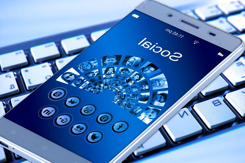 Contact support team image with mobile technology background